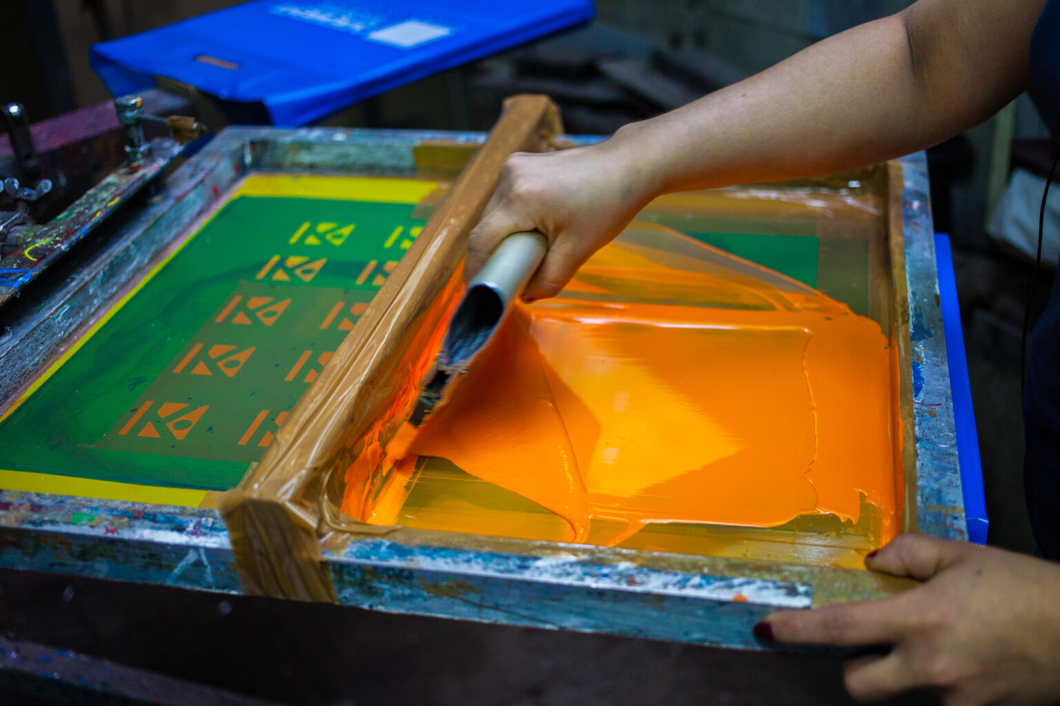 Press silk-screen printing by orange paint.