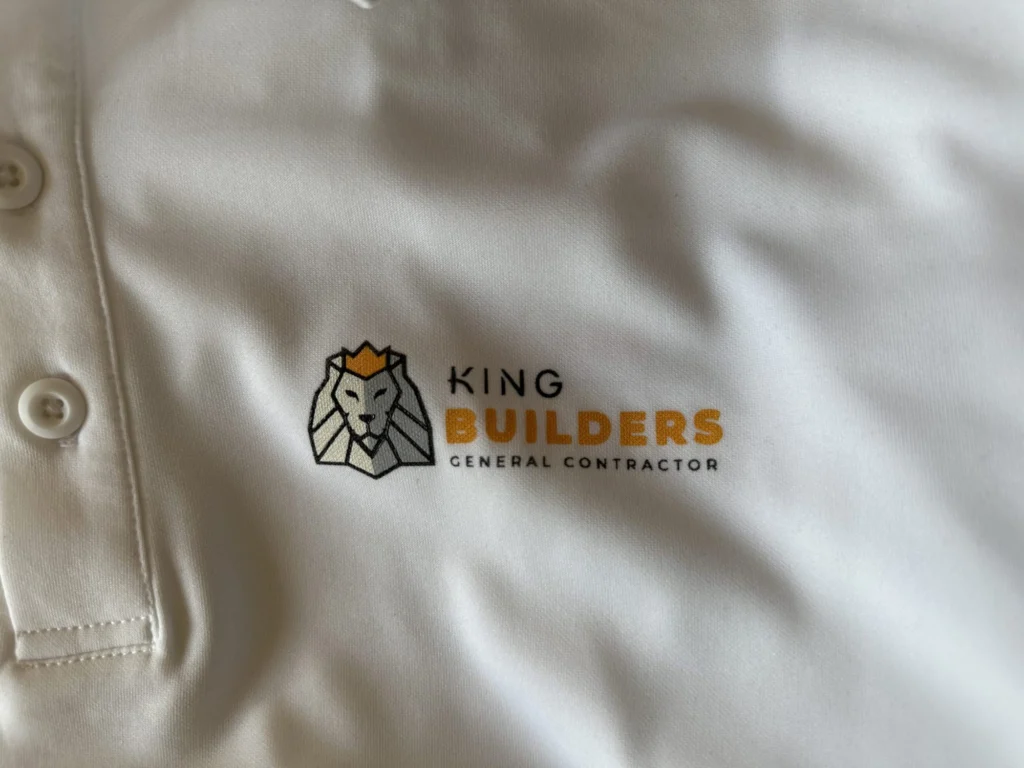 Close up of screen printed t-shirt design on white polo