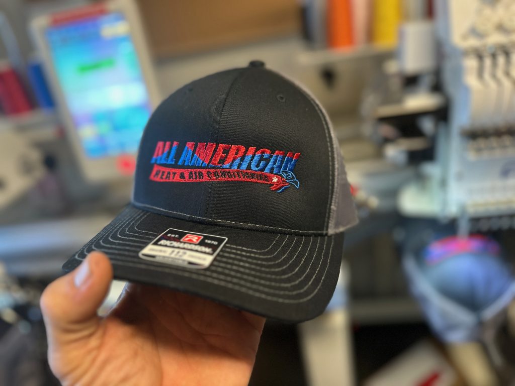 Embroidered baseball caps for All American Heat & Air Conditioning out of Idaho