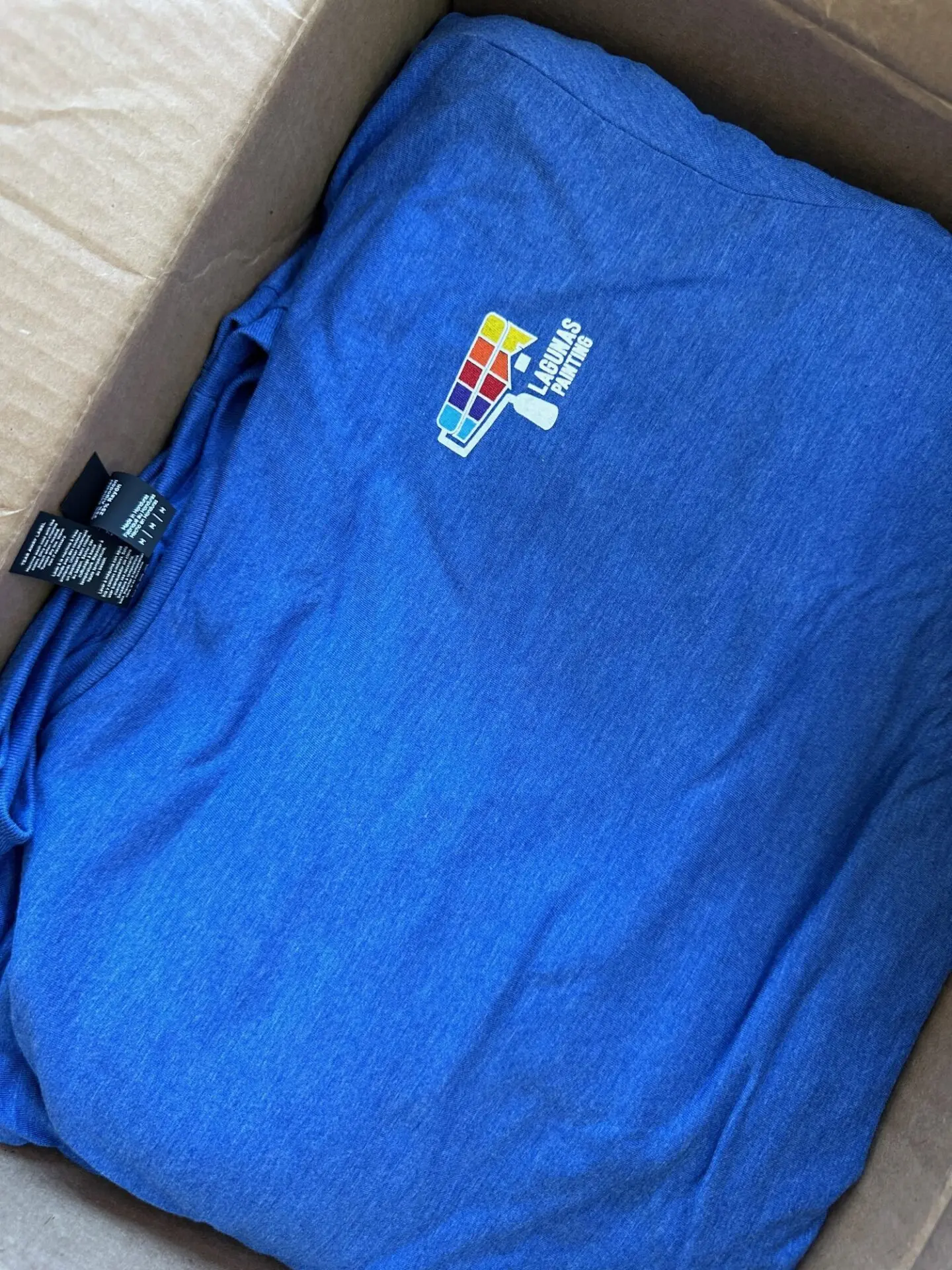 Logo embroidered onto company shirts in bulk