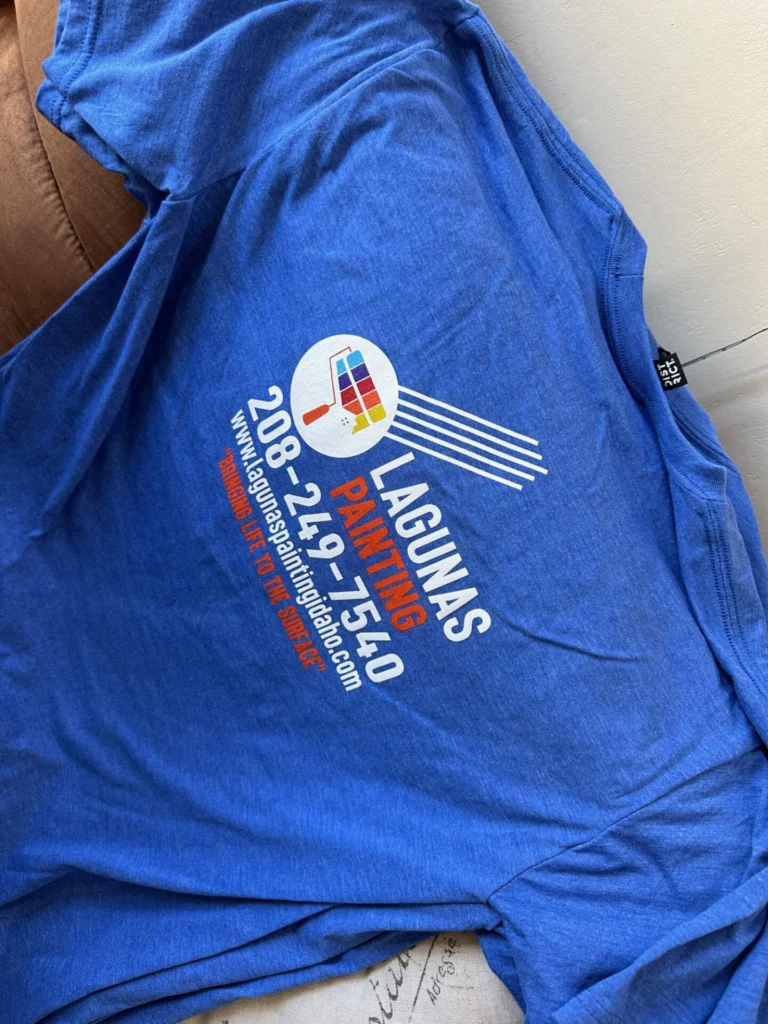 Company logo screen printed onto back of custom shirts in bulk