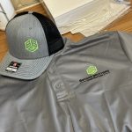 Custom embroidered polo and custom embroidered hat for local company