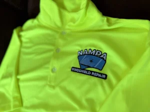 Custom hi-vis safety green polo shirts with left chest logo embroidery at The Print Plug in Nampa