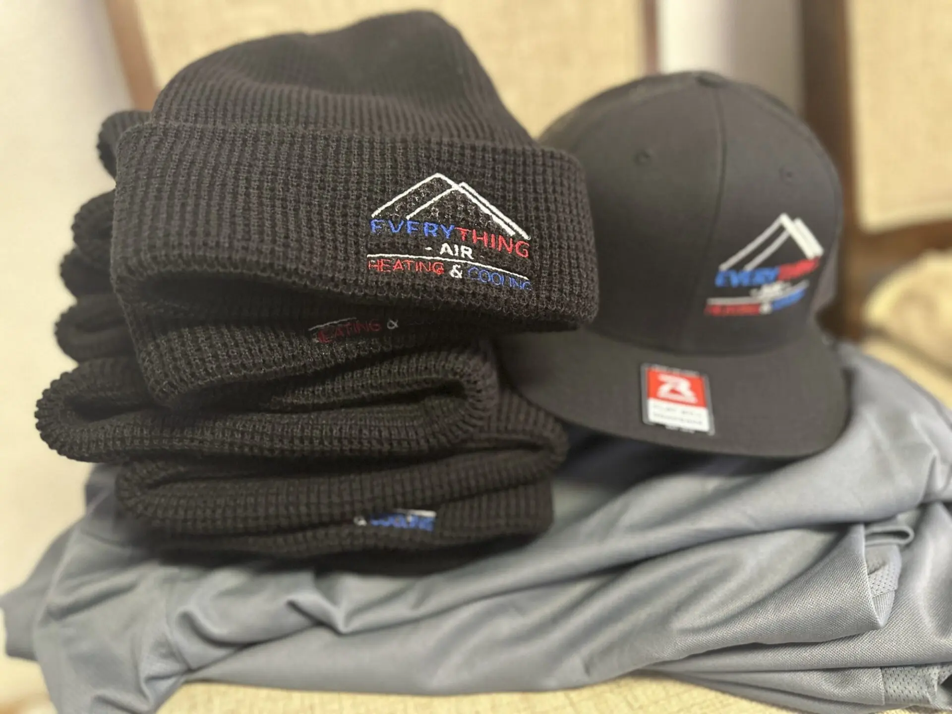 Custom embroidered beanies and baseball caps