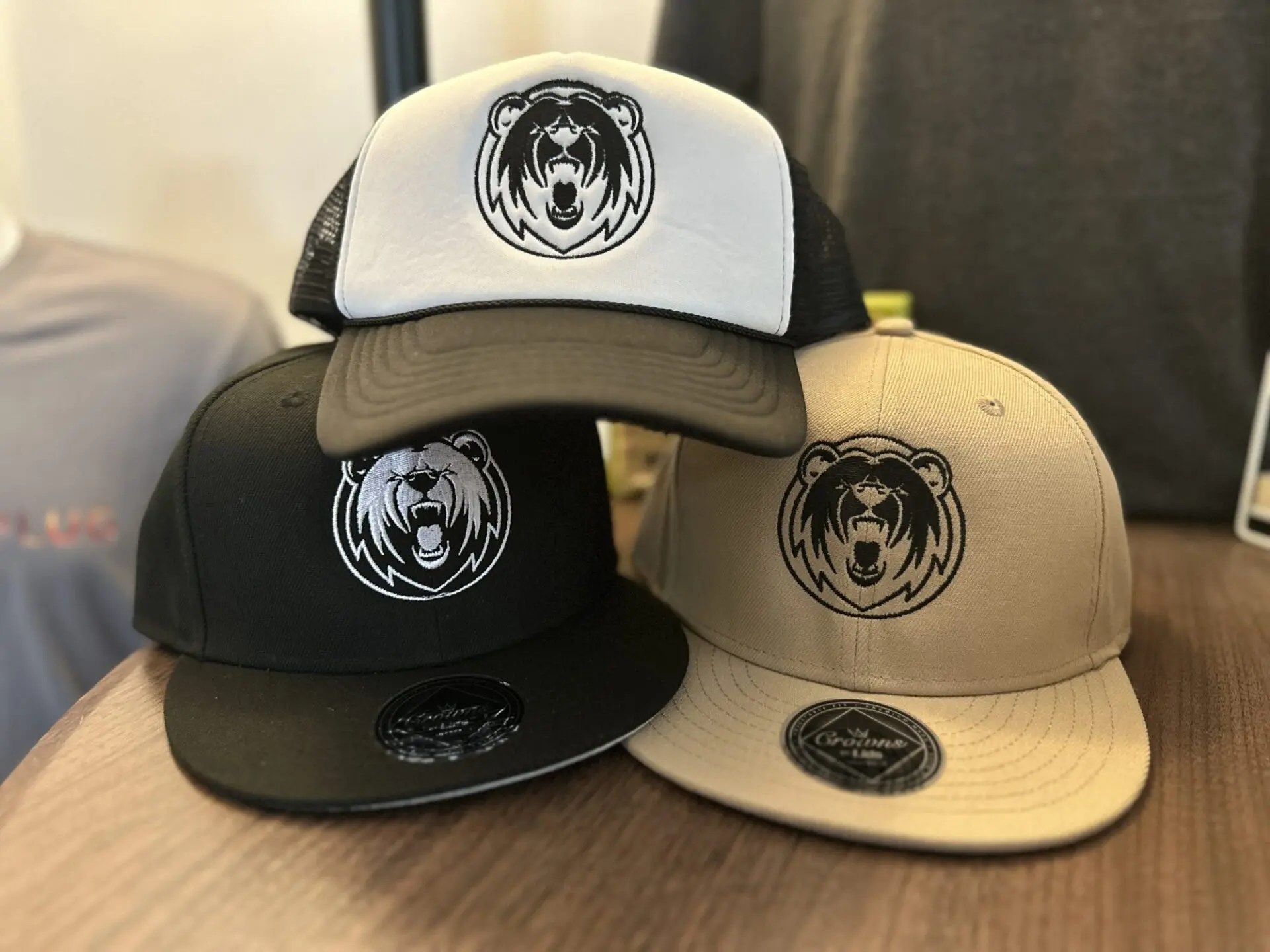 Single color embroidered logo on various assorted trucker hats