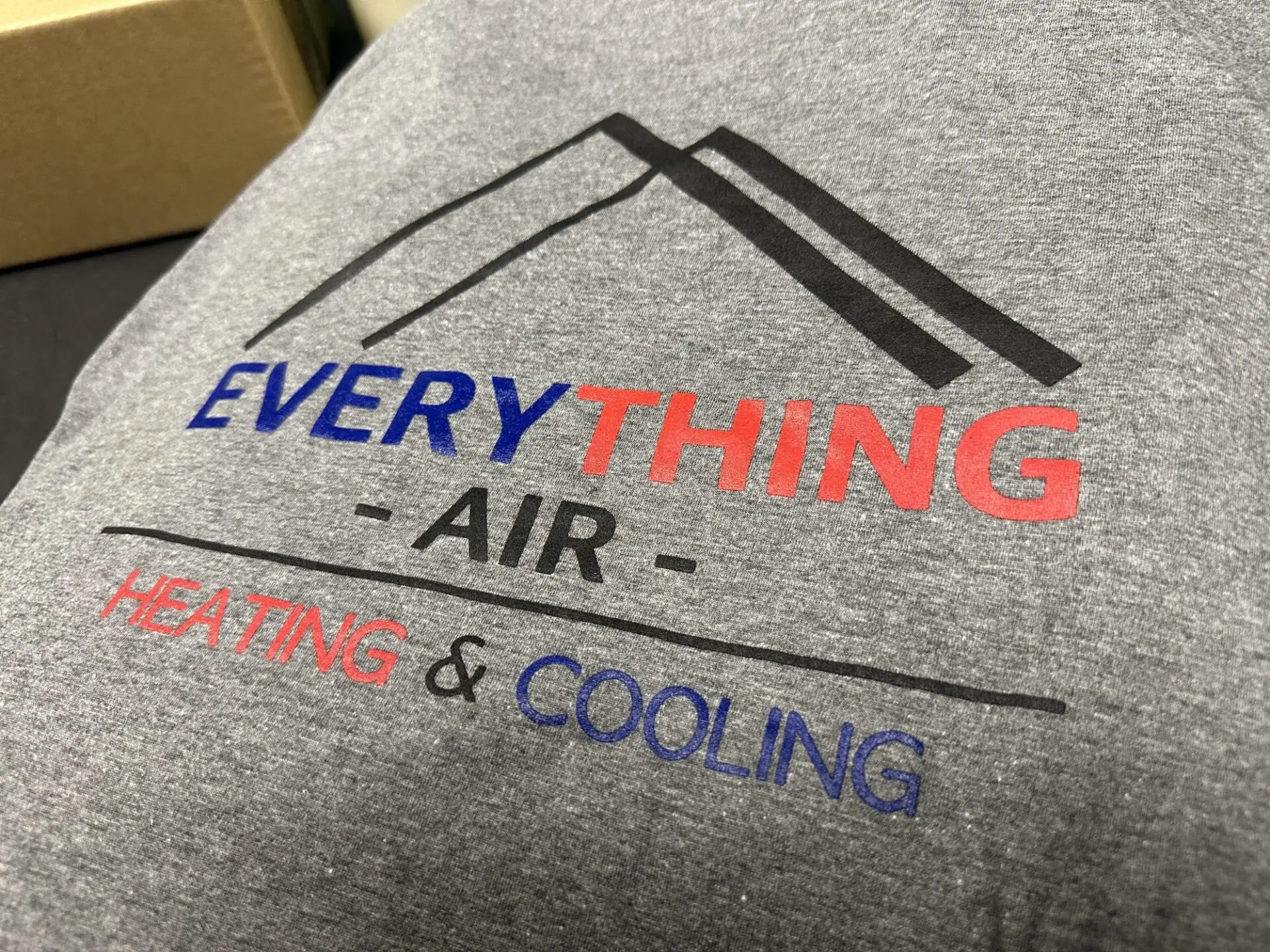 Custom screen printing onto business t-shirts in Nampa