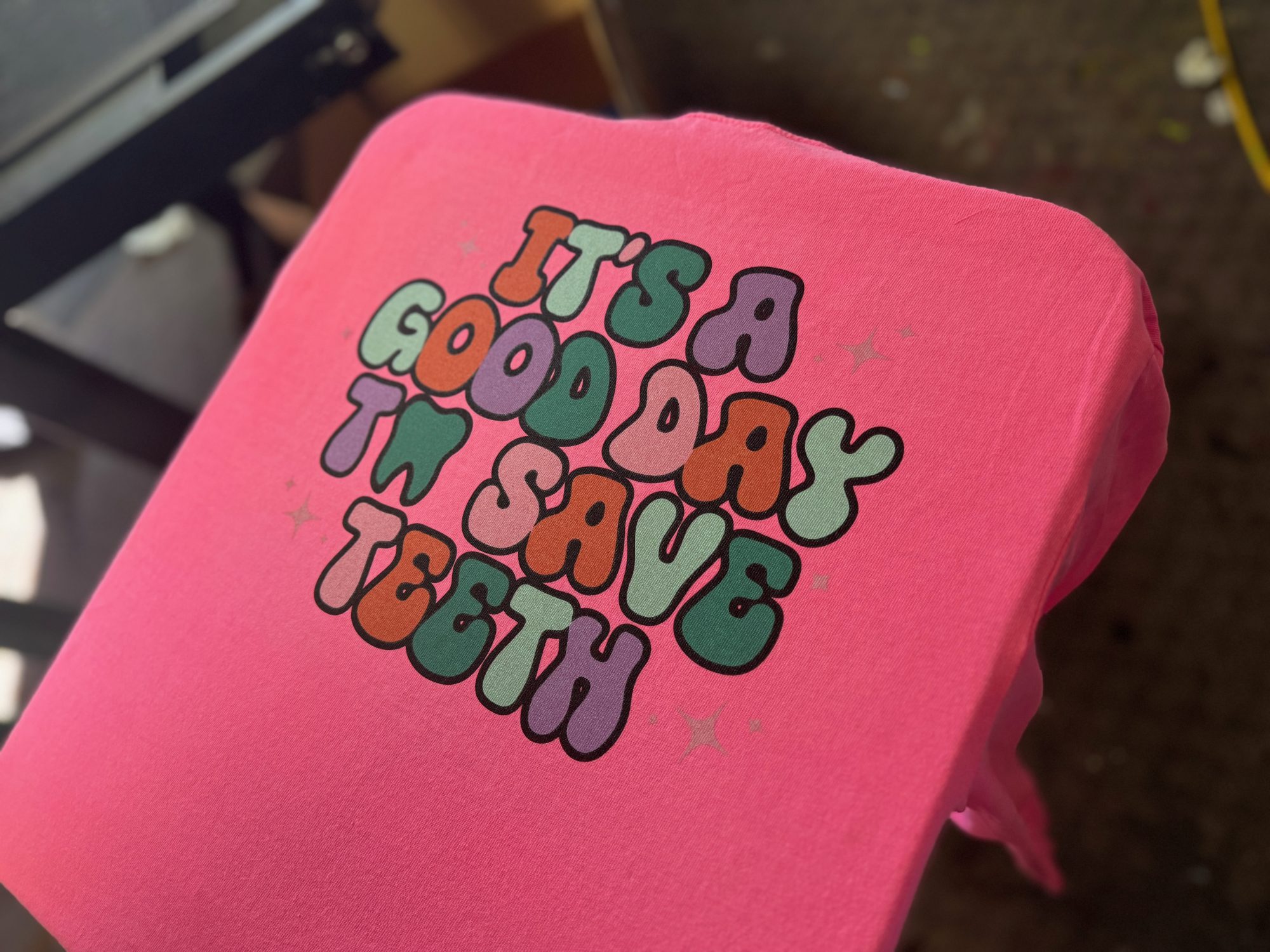 Customized screen printed t-shirt for local dentist office at The Print Plug in Nampa