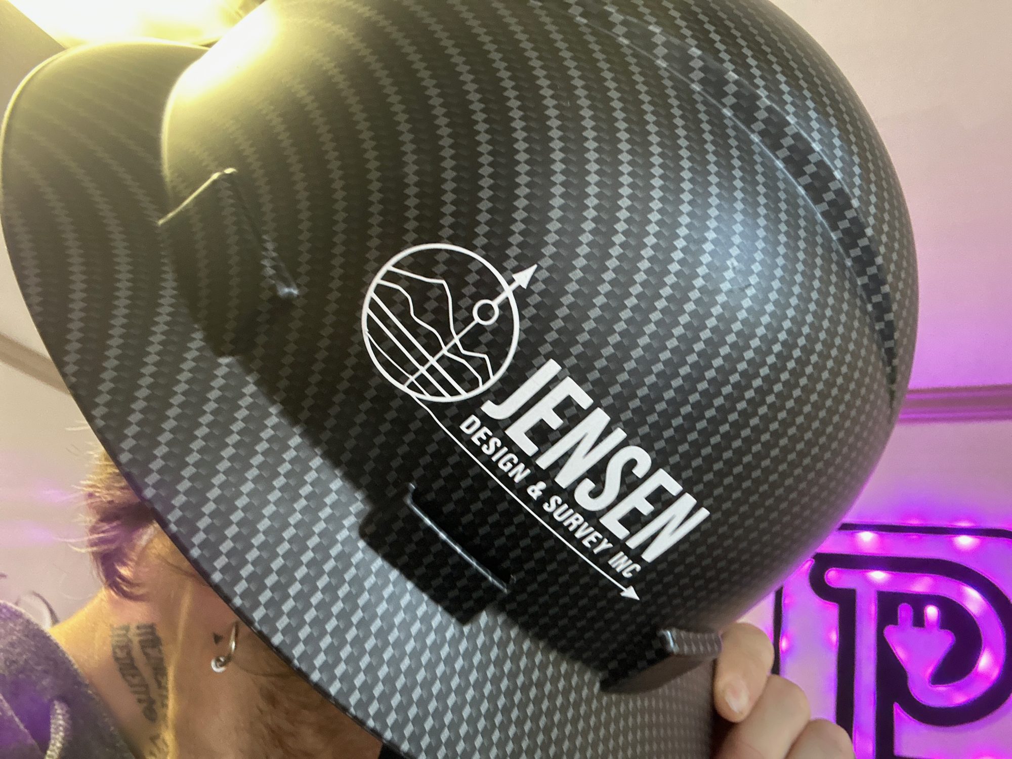 Custom decal applied onto a hard hat for a client in Nampa