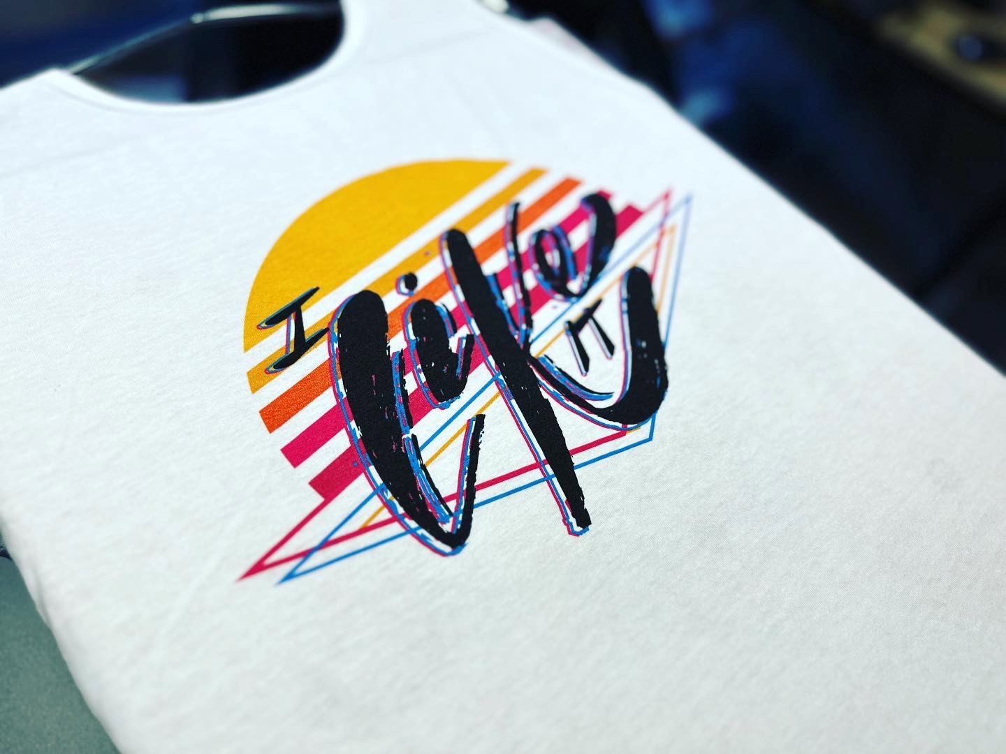 Custom graphic tee with bright colors from The Print Plug in Nampa