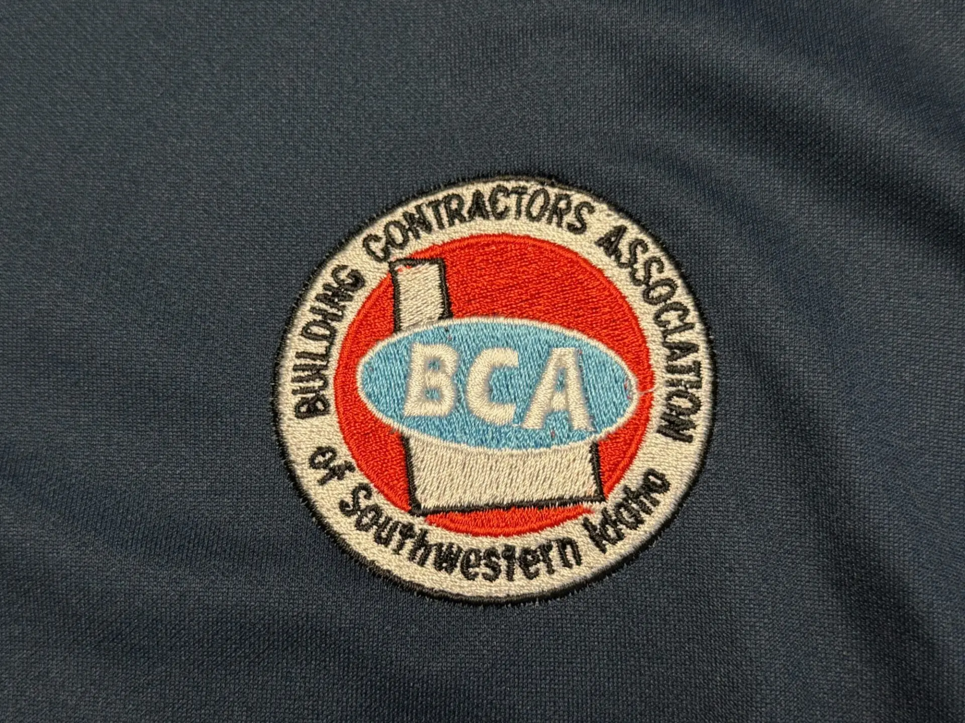 Custom embroidered logo with fine detail for a large contractor near Nampa