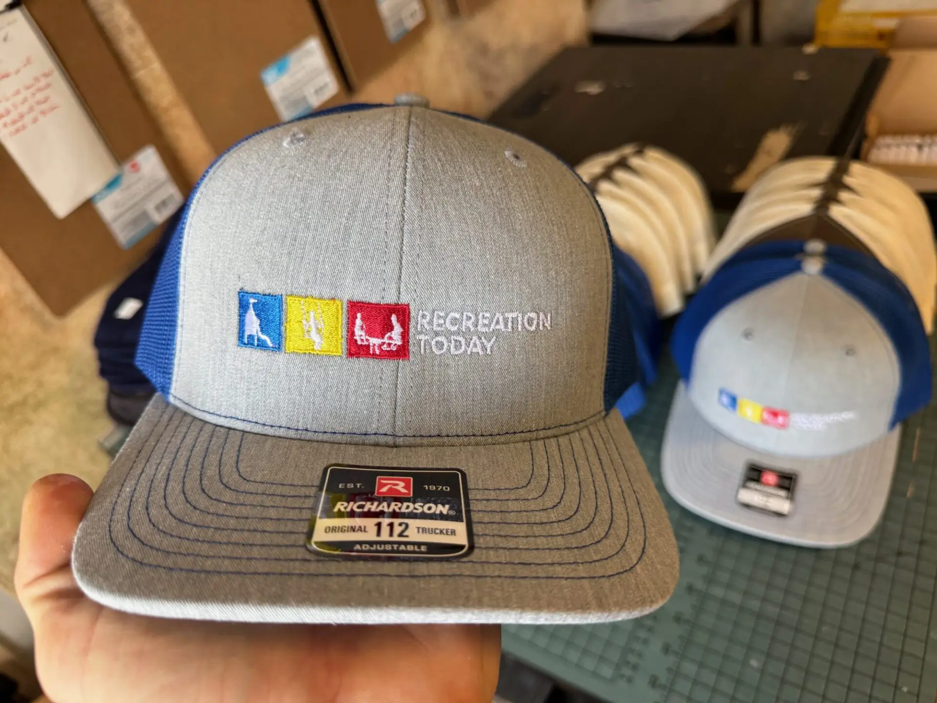 Custom embroidered baseball hats for local company from The Print Plug in Nampa
