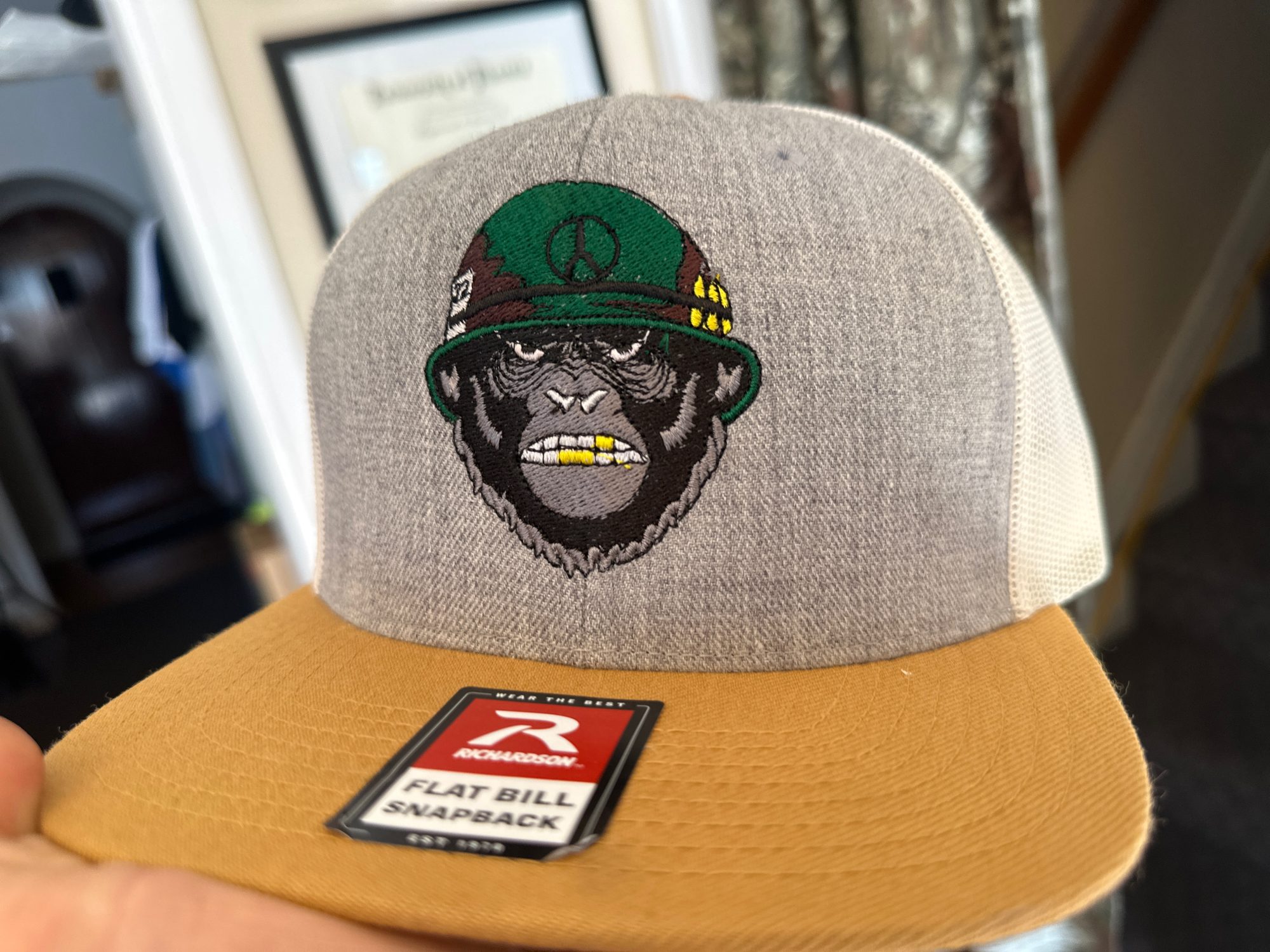 Custom embroidered hat with embroidered design of a gorilla