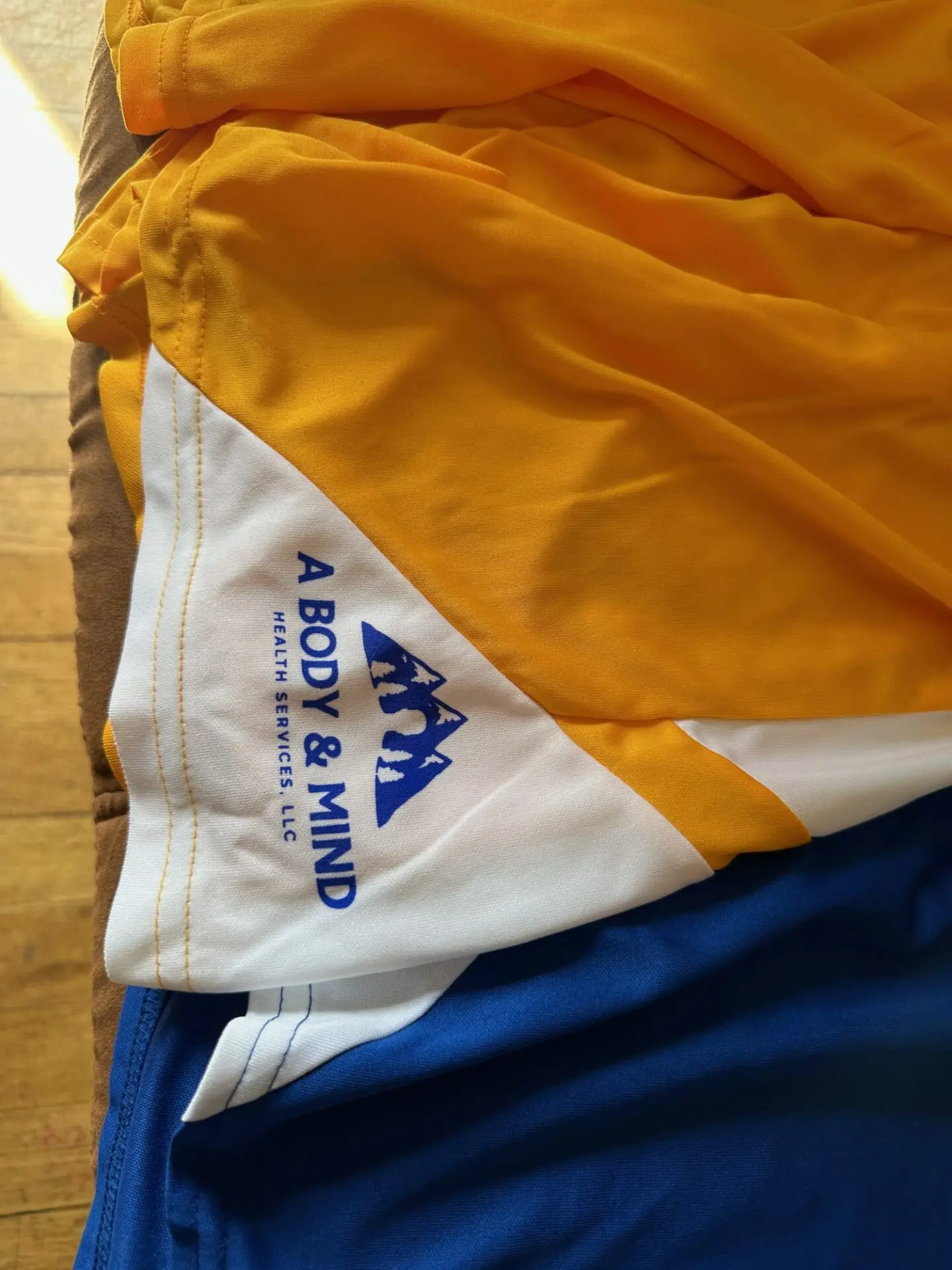 Custom screen printed shorts created for a local rehab center in Nampa