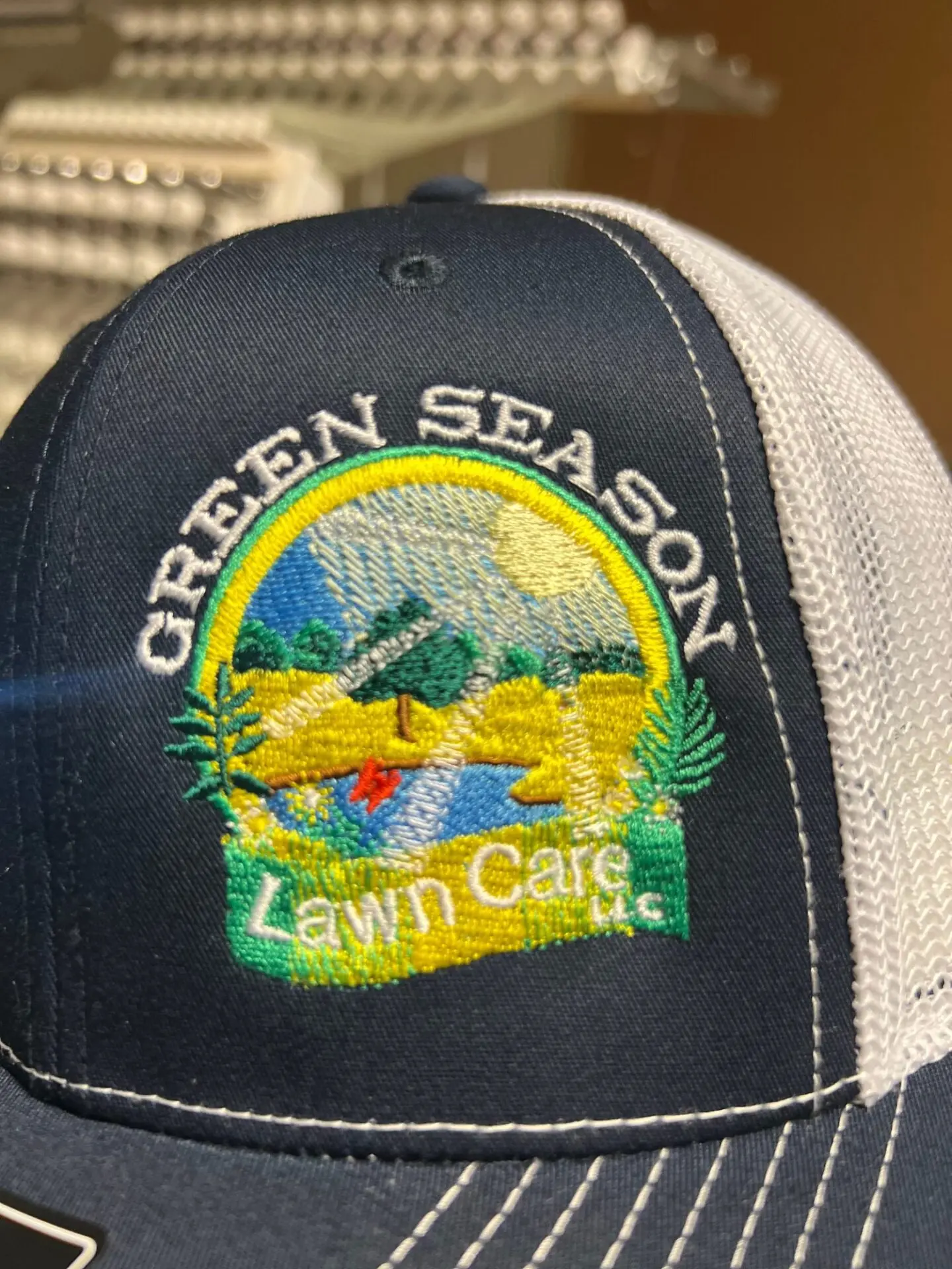 Custom embroidered hat with beautiful intricate design a for a local company in Nampa