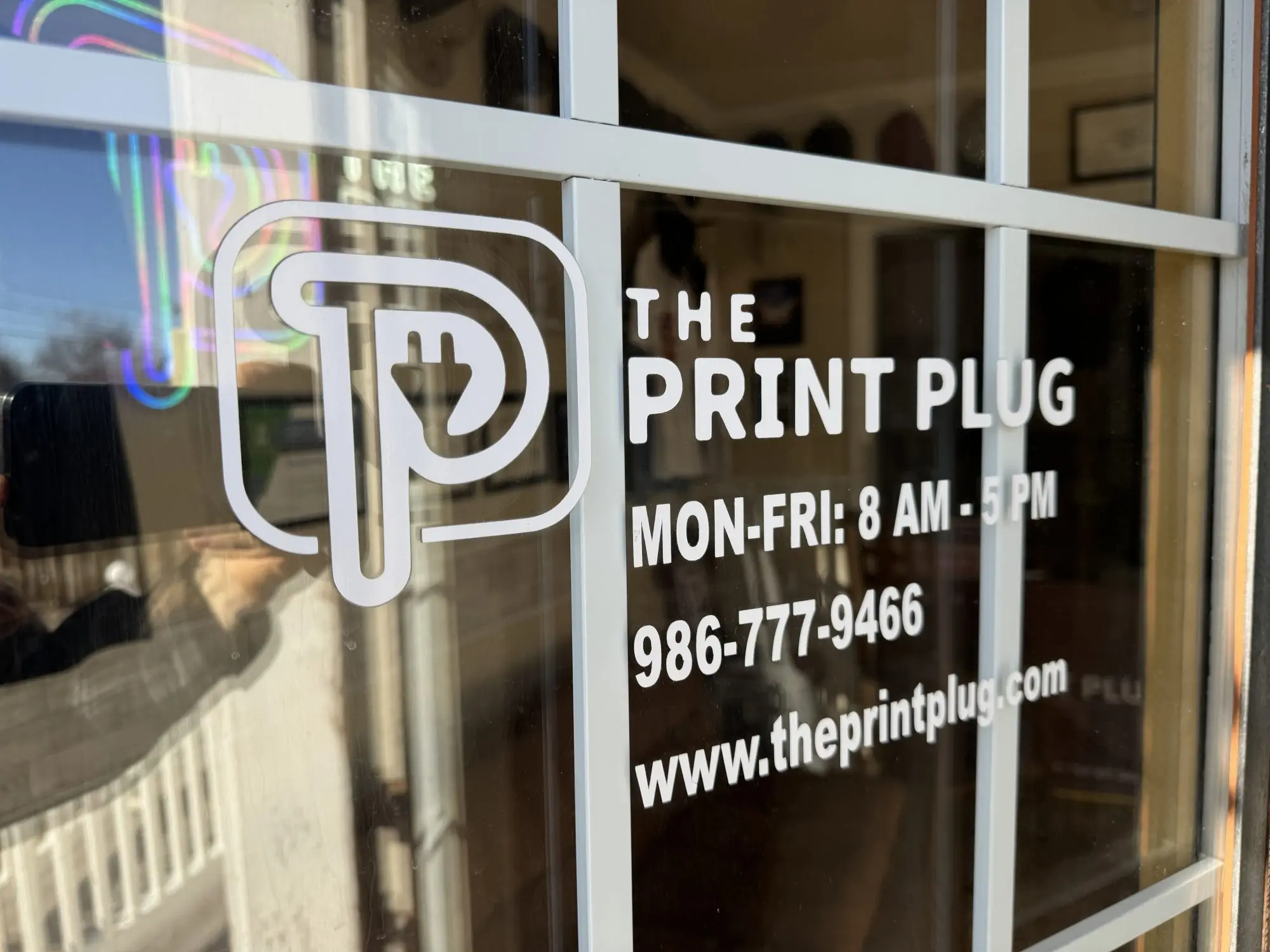 Close up a window decal at The Print Plug in Nampa