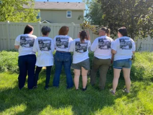 Showing custom made shirts at a memorial