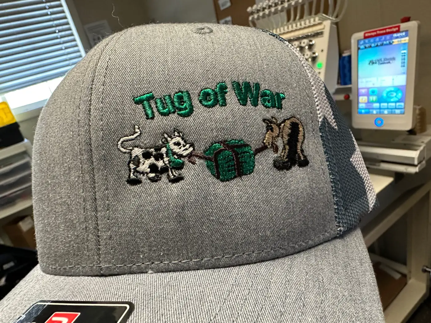 Custom embroidered work hat with cartoon characters