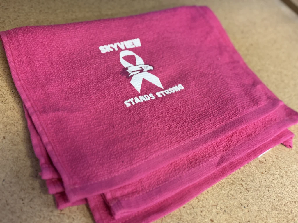 Custom screen printed towels for breast cancer awareness