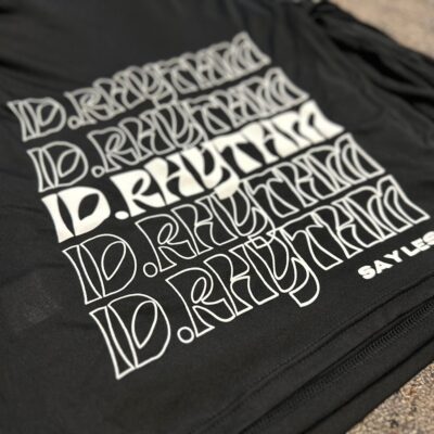 Screen printed design on custom t-shirts at The Print Plug screen printing shop in Nampa