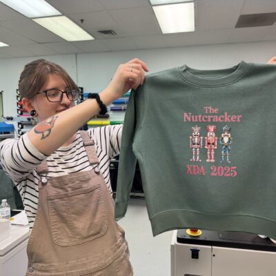 Showing off a custom printed holiday sweater