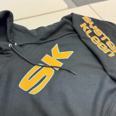 Hoodie with front and sleeve placement printed in DTF