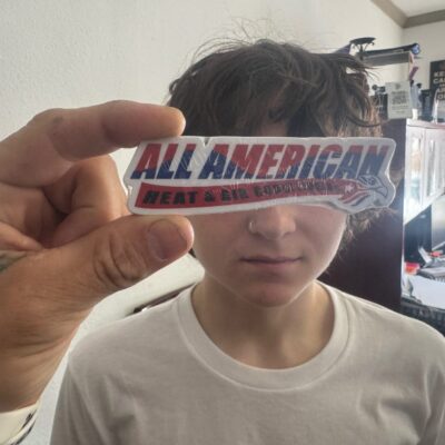 Custom vinyl sticker being showed off at The Print Plug in Nampa