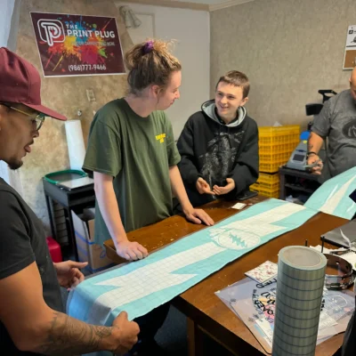Reviewing a large decal in Nampa