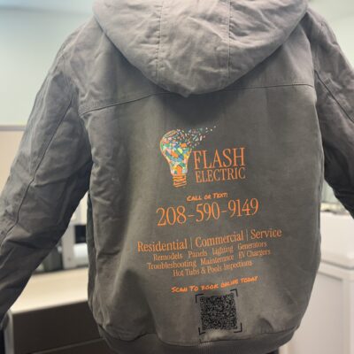DTF graphic printed onto the back of a heavyweight coat