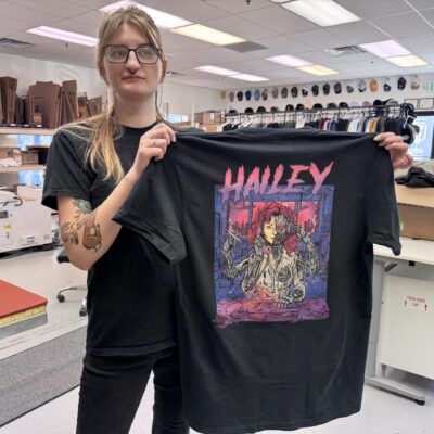 Showing off graphic tee made with direct-to-film printing