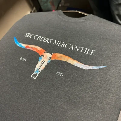 Watercolor graphics on a custom t-shirt from The Print Plug