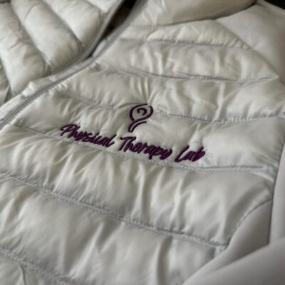 Custom embroidered jacket with company logo embroidered on the left chest