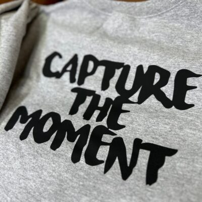 Close up of a custom HTV print on a t-shirt at The Print Plug in Nampa