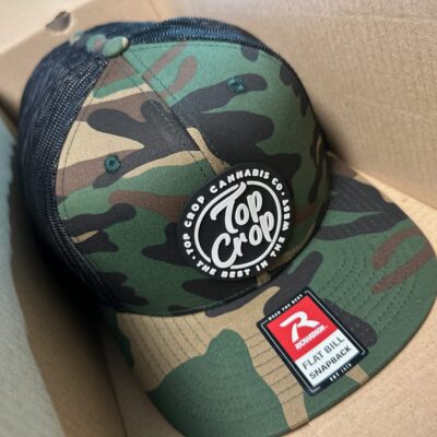 Custom PVC patches on baseball hats for a local dispensary near Nampa, Idaho