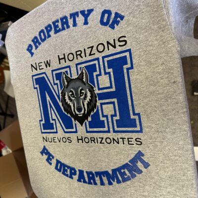 Custom screen printed shirt for a local school at The Print Plug in Nampa