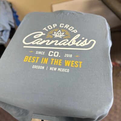 Custom t-shirt printed at The Print Plug screen printing shop for a local dispensary