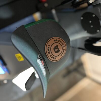 Custom leather patches pressed onto baseball hat