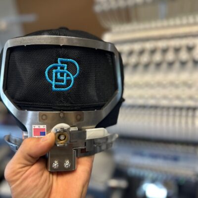 Logo embroidered on back of a baseball hat at The Print Plug